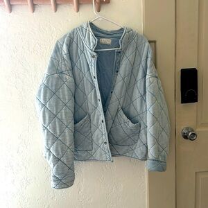 Crafted from midweight knit denim French terry long sleeve with button front